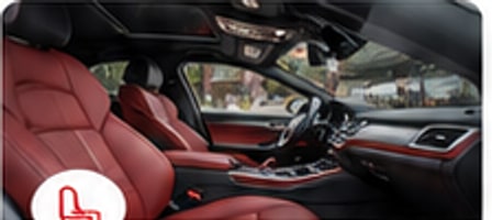 Clean vehicle interior with red seats